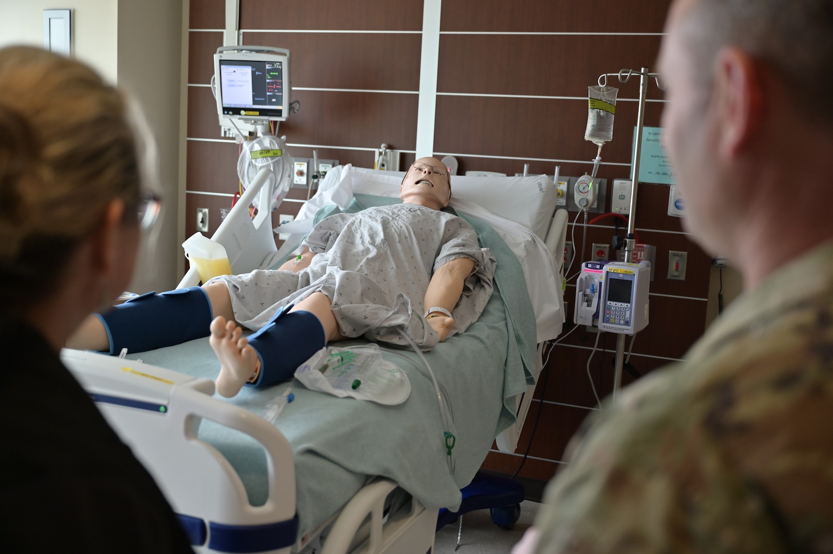 Spot the hazard: CRDAMC staff test their patient safety skills in the “Room of Errors,” identifying potential risks in a simulated car setting during Patient Safety Awareness Week.