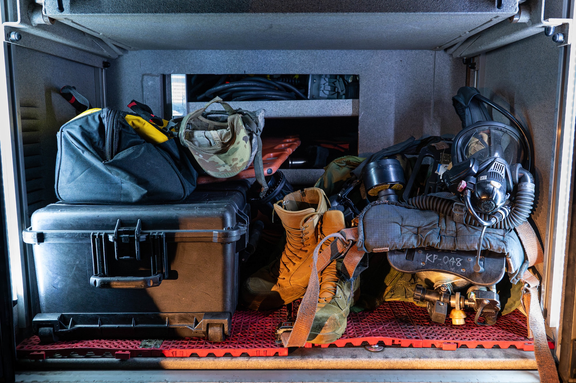 U.S. Air Force 18th Civil Engineer Squadron firefighter equipment lays inside a firetruck ready to be donned at a moment's notice during U.S. Air Force-led operational exercise, Beverly Midnight 26 at Kadena Air Base, Japan, March 12, 2026. BM26 enhances U.S. interoperability by fostering an exchange of information and refining shared tactics, techniques and procedures to better integrate defense capabilities in support of regional security. (Photo by U.S. Air Force Airman 1st Class Nathaniel Jackson)