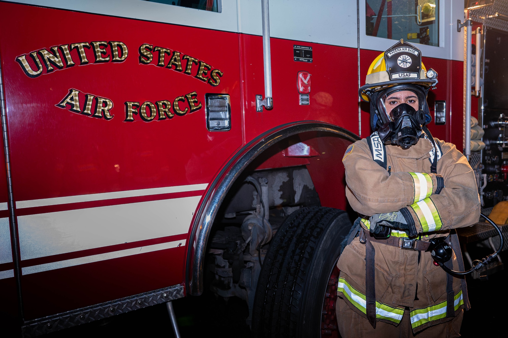 U.S. Air Force Airman 1st Class Bailey Keahra, an 18th Civil Engineer Squadron firefighter, poses for a photo during U.S. Air Force-led operational exercise, Beverly Midnight 26 at Kadena Air Base, Japan, March 12, 2026. BM26 provided unique opportunities to synchronize and integrate various forces across Japan into joint, coalition and bilateral training from simulated forward operating bases. (Photo by U.S. Air Force Airman 1st Class Nathaniel Jackson)
