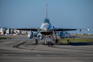 A U.S. Air Force F-16C Fighting Falcon assigned to the 120th Expeditionary Fighter Squadron, deployed to Kadena Air Base, undergoes hot pit refueling by U.S. Marines during a USAF-led operational exercise Beverly Midnight 26 at Marine Corps Air Station Futenma, Japan, March 11, 2026. PACAF forces routinely exercise and train at various locations, demonstrating our collective ability to deploy airpower throughout the Pacific. (U.S. Air Force photo by Airman 1st Class Francisco Huerta)