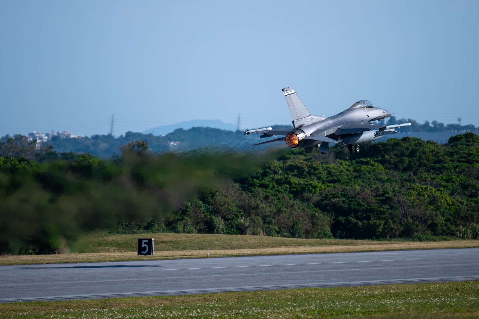 A U.S. Air Force F-16C Fighting Falcon assigned to the 120th Expeditionary Fighter Squadron, deployed to Kadena Air Base, takes off during a USAF-led operational exercise Beverly Midnight 26 at Marine Corps Air Station Futenma, Japan, March 11, 2026. BM26 enhances U.S. interoperability by fostering an exchange of information and refining shared tactics, techniques and procedures to better integrate defense capabilities in support of regional security. (U.S. Air Force photo by Airman 1st Class Francisco Huerta)