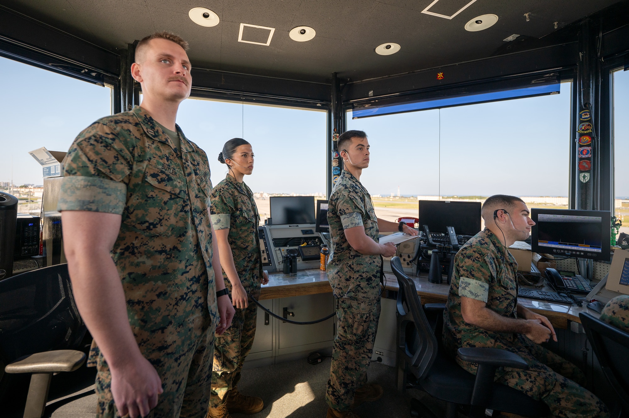 U.S. Marine Corps air traffic controllers assigned to Headquarters and Headquarters Squadron, Marine Corps Air Station Futenma, monitor U.S. Air Force F-16C Fighting Falcons, deployed to Kadena Air Base, on radar from the air traffic control tower during a USAF-led operational exercise Beverly Midnight 26 at Marine Corps Air Station Futenma, Japan, March 11, 2026. BM26 reinforces the United States’ continued commitment to a free and open Indo-Pacific region. (U.S. Air Force photo by Airman 1st Class Francisco Huerta)