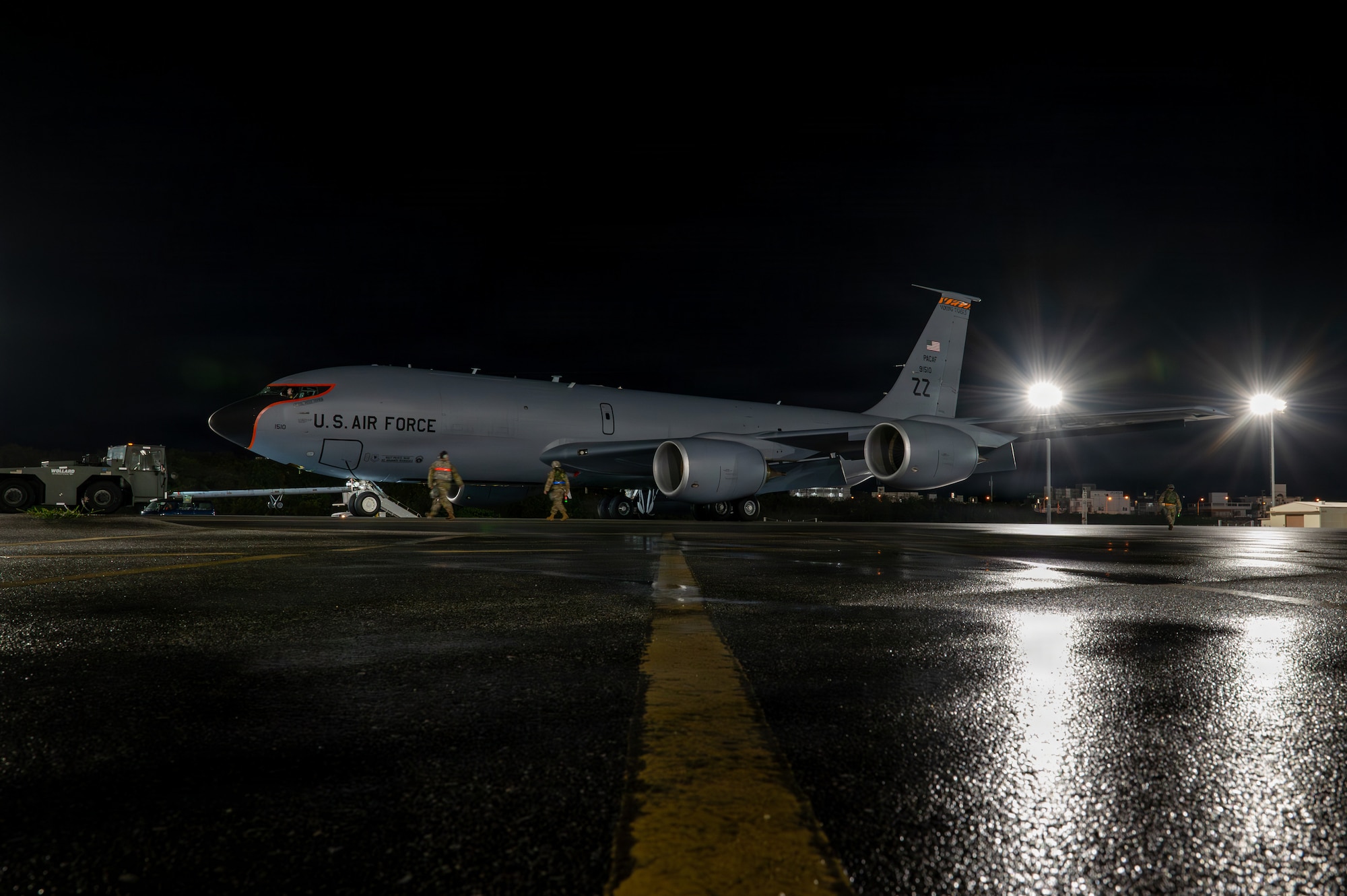 Airmen pull an aircraft.