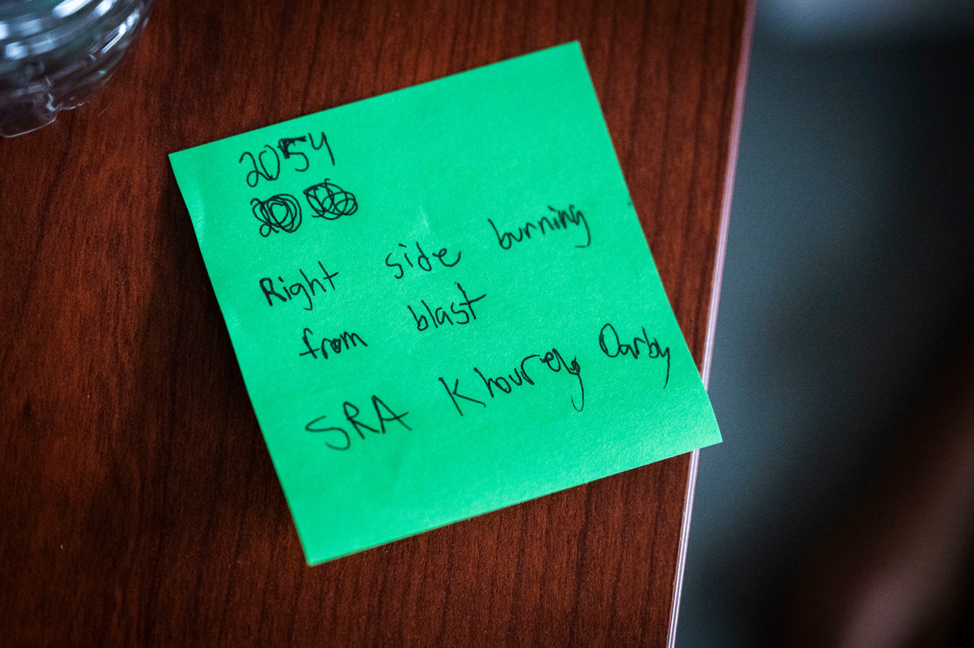 A sticky note with details of an injury sticks to a desk during a U.S. Air Force led operational exeris Beverly Midnight 26 at Kadena Air Base, Japan, March 13, 2026. BM26 tested rapid response capabilities to prepare Airmen for potential emergencies in the Indo-Pacific region. (U.S. Air Force photo by Senior Airman James Johnson)