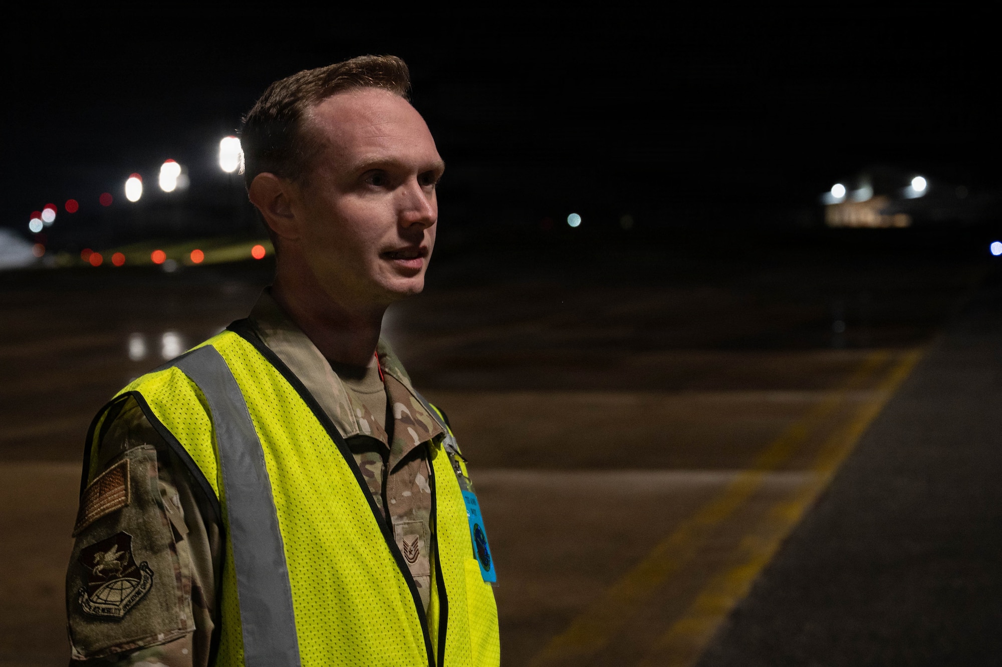 Airman simulating sweep after UXO.