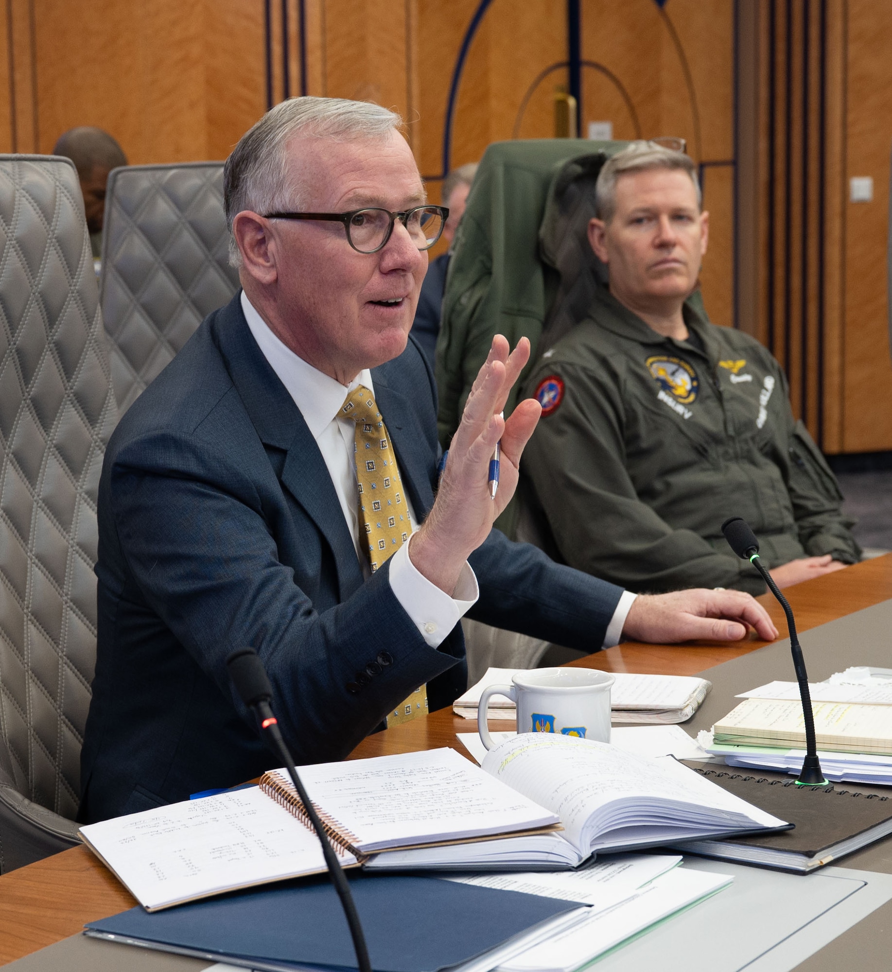 U.S. Navy Vice Admiral Bruce Lindsey (retired), senior mentor, asks a question after a briefing during the Combined Forces Air Component Command conference