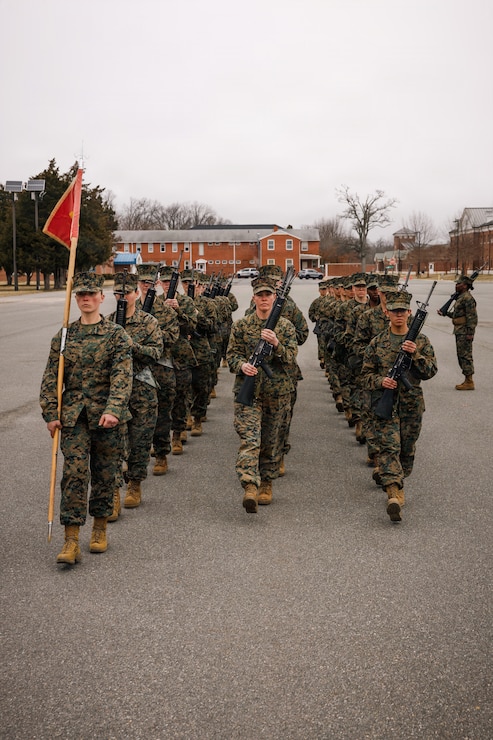 U.S. Marine Corps candidates with Officer Candidates Course 251, Company A and D, Officer Candidates School, participate in Final Drill Evaluation at Marine Corps Base Quantico, Virginia, March 7, 2026. Candidates are evaluated on the application of learned concepts in the practice of drill as well as being a unit leader. (U.S. Marine Corps photo by Cpl. Joshua Barker)