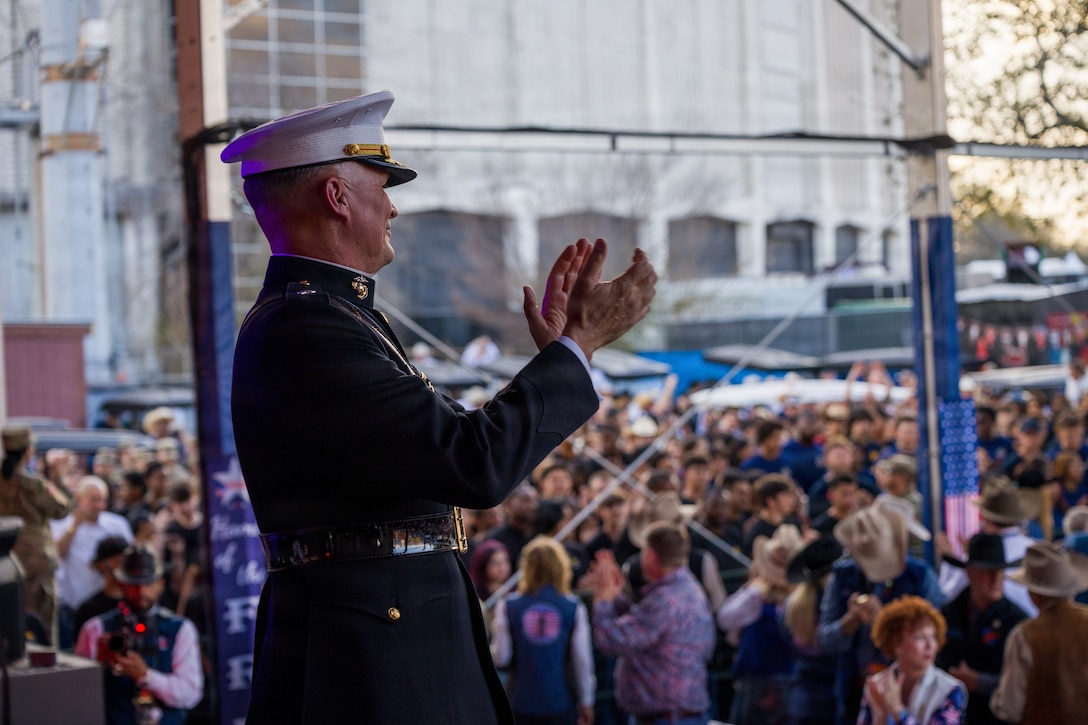 U.S. Marine Corps Lt. Gen. Leonard F. Anderson IV, commander of Marine Forces Reserve and Marine Forces South, congratulates approximately 500 new military recruits at the Houston Livestock Show and Rodeo Armed Forces Appreciation Day in Houston, March 4, 2026. Armed Forces Appreciation Day honored nearly 4,000 military personnel and veterans, including a joint service enlistment ceremony for new recruits. (U.S. Marine Corps photo by SSgt. Ethan M. LeBlanc)