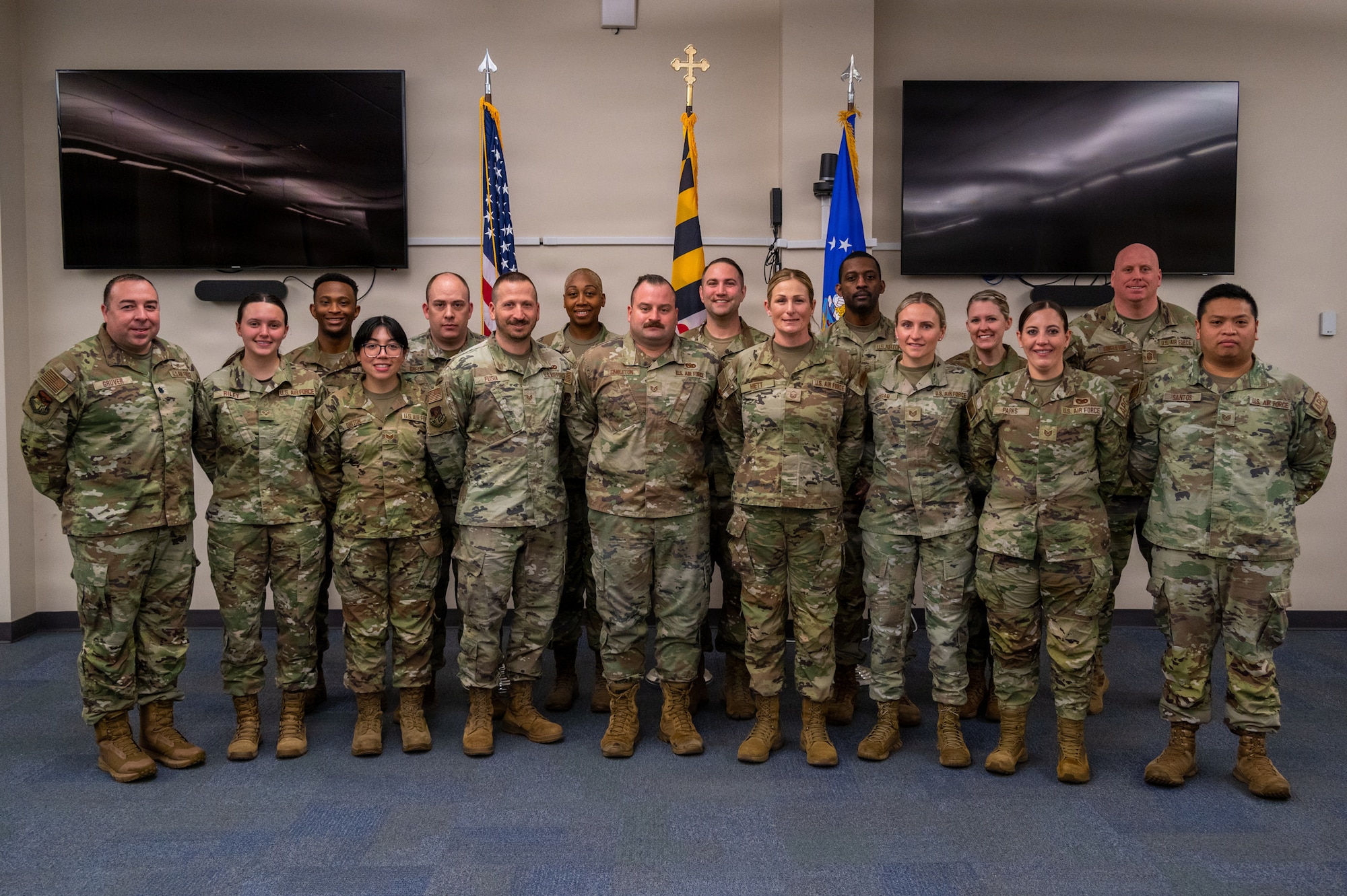Maryland Air National Guard recruiters of the 175th Wing gather for a group photo at Warfield Air National Guard Base at Martin State Airport, Maryland, March 10, 2026. The Air National Guard recently announced that the recruiting and retention team of the Maryland Air National Guard ranked third amongst all Air National Guard recruiting teams for total accessions for the time period of October 25, 2025 through January 31, 2026. (U.S. Air National Guard Photo by Airman 1st Class Sarah Hoover)