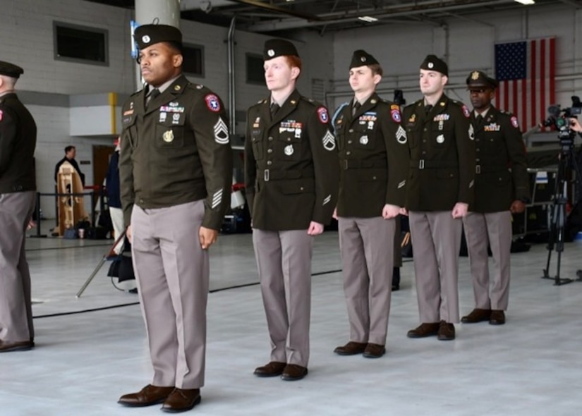 U.S. Army Soldiers from the Kansas City Recruiting Battalion stand in formation inside a downtown airport hangar, March 2, 2026, during a ceremony marking the arrival of the “Freedom Plane.” The Soldiers provided ceremonial support and assisted in safeguarding historic documents transported for museum display and secure storage.