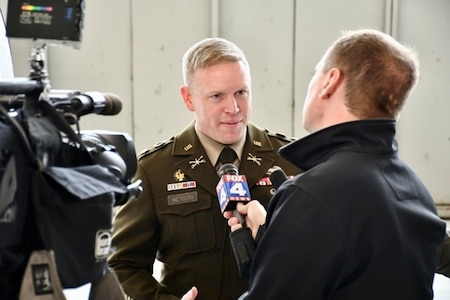 Lt. Col. Andrew Betson, commander of the U.S. Army Recruiting Battalion Kansas City, speaks with local media during the Freedom Plane ceremony at the downtown airport, March 2, 2026. The event marked the arrival of nationally significant historic artifacts and World War I-era documents that will be preserved and displayed at the National WWI Museum and Memorial in Kansas City.