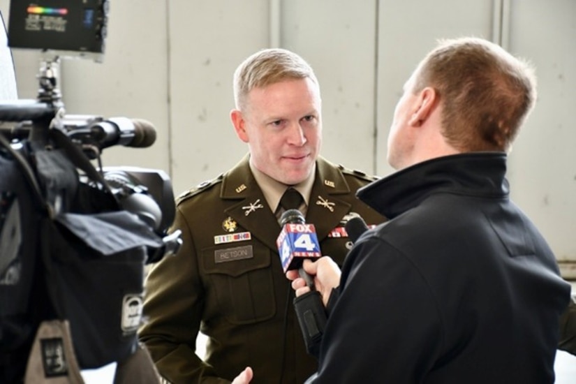 Lt. Col. Andrew Betson, commander of the U.S. Army Recruiting Battalion Kansas City, speaks with local media during the Freedom Plane ceremony at the downtown airport, March 2, 2026. The event marked the arrival of nationally significant historic artifacts and World War I-era documents that will be preserved and displayed at the National WWI Museum and Memorial in Kansas City.
