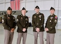 Soldiers assigned to the U.S. Army Recruiting Battalion Kansas City pose for a photo inside the hangar following the Freedom Plane ceremony at the downtown airport, March 2, 2026. The Soldiers participated in the arrival and secure transfer of historic artifacts and World War I-era documents that will be preserved and displayed at the National WWI Museum and Memorial in Kansas City.