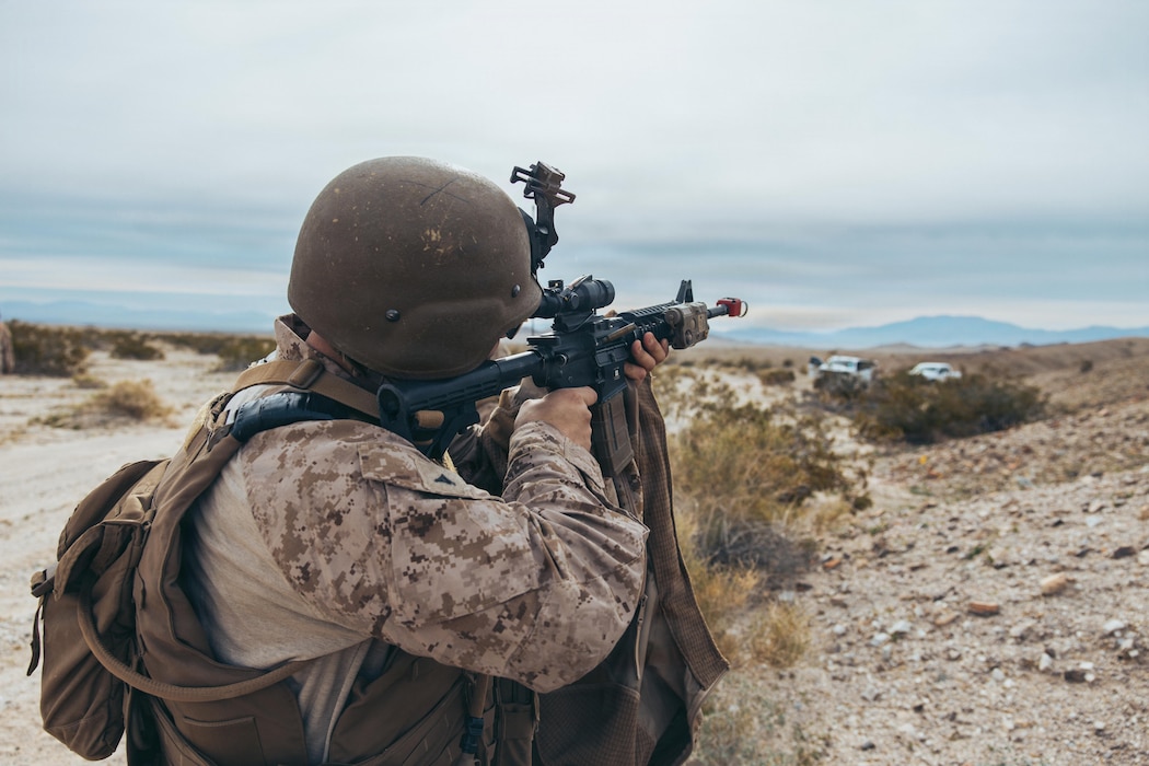 CLB-7 and 4th LEB Conduct LCE FWD Movement Training During SLTE 1-26U.S. Marine Corps Lance Cpl. Brian Kozul, a California native, military police officer with 4th Law Enforcement Battalion, Force Headquarters group, Marine Forces Reserve, holds a position with an M4 rifle during a simulated contested environment exercise as part of Service Level Training Exercise 1-26 at Marine Corps Air Ground Combat Center, Twentynine Palms, California, Jan. 28, 2026. SLTE assesses Marine Air Ground Task Forces abilities to plan, coordinate and execute large-scale operations by integrating command and control, maneuver, sustainment and live-fire events in realistic training environments. (U.S. Marine Corps photo by Lance Cpl. Parker Peichel)