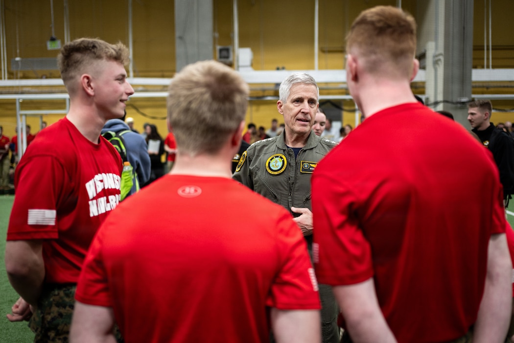 Adm. Steve Koehler, commander, U.S. Pacific Fleet, a University of Colorado Boulder alumnus, right, speaks with Naval ROTC Midshipmen competing in the annual Colorado Meet after the opening ceremony at CU Boulder, March 6, 2026. For 100 years, NROTC has been one of our Nation’s proven Foundries of Navy and Marine Corps Officers – forging leaders who are united in purpose, resilient in spirit, and committed to ensuring that our Navy and Marine Corps Combat Team remains ready to fight and win tonight, tomorrow and well into the future.