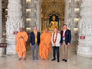 Left of center, Gen. Stephen Whiting, U.S. Space Command commander, poses for a photo at the Swaminarayan Akshardham temple alongside U.S. Ambassador to India Sergio Gor, U.S. Deputy Secretary of State Christopher Landau, and two monks in New Delhi, March 4, 2026. Whiting arrived during Holi, the Hindu festival of colors, and was welcomed with a tour of the temple showcasing India’s rich spiritual and artistic heritage.