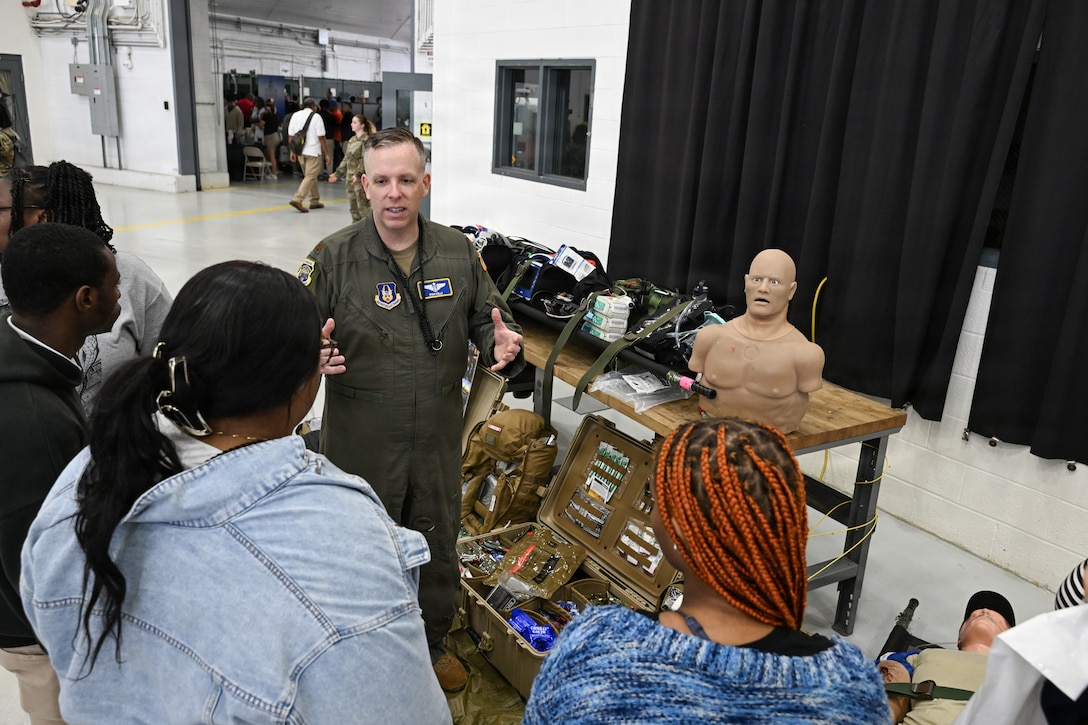 Students looking at a booth.