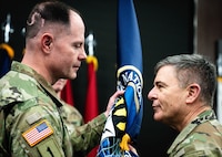 BG Lennox speaking with LTG Hartman at Change of Command Ceremony