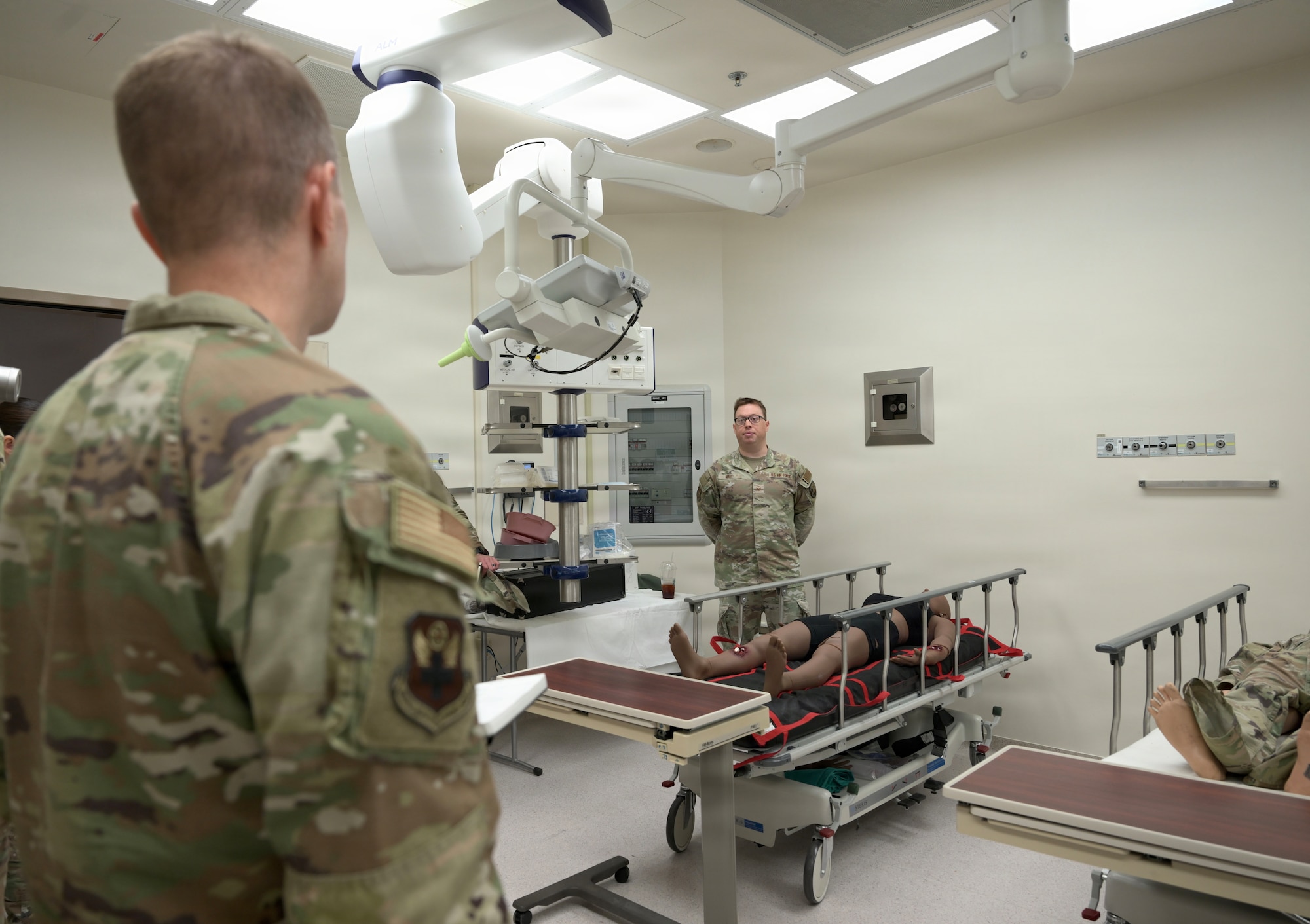 Air Force Medical professionals brief about operating room functions.
