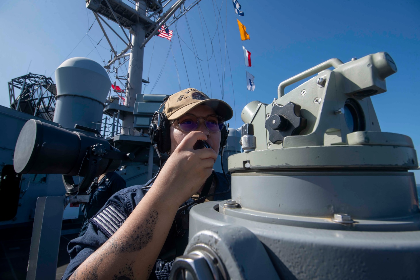 Quartermaster 2nd Class Soledh Rivera uses a sound-powered telephone aboard U.S. 7th Fleet flagship USS Blue Ridge (LCC 19) as the ship prepares to enter port in Manila, Philippines, March 16, 2026.