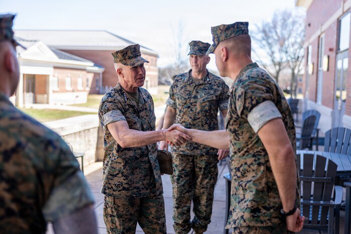 The 39th Commandant of the Marine Corps, Gen. Eric M. Smith, greets the instructors of Warrant Officer Basic Course (WOBC) India Company at Marine Corps Base Quantico, Virginia, March 3, 2026. Gen. Smith visits WOBC toward the end of each cycle of a company to speak with the instructors and spark discussion with the students, giving them advice as the new warrant officers continue their journey into the fleet Marine force and answer any career questions they have on their future leading in the Marine Corps. (U.S. Marine Corps photo by Cpl. Juaquin Greaves)