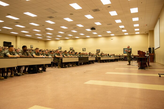 The 39th Commandant of the Marine Corps, Gen. Eric M. Smith, answers questions from students of Warrant Officers Basic Course (WOBC) India Company at Marine Corps Base Quantico, Virginia, March 3, 2026. Gen. Smith visits WOBC toward the end of each cycle of a company to speak with the instructors and spark discussion with the students, giving them advice as the new warrant officers continue their journey into the fleet Marine force and answer any career questions they have on their future leading in the Marine Corps. (U.S. Marine Corps photo by Cpl. Juaquin Greaves)