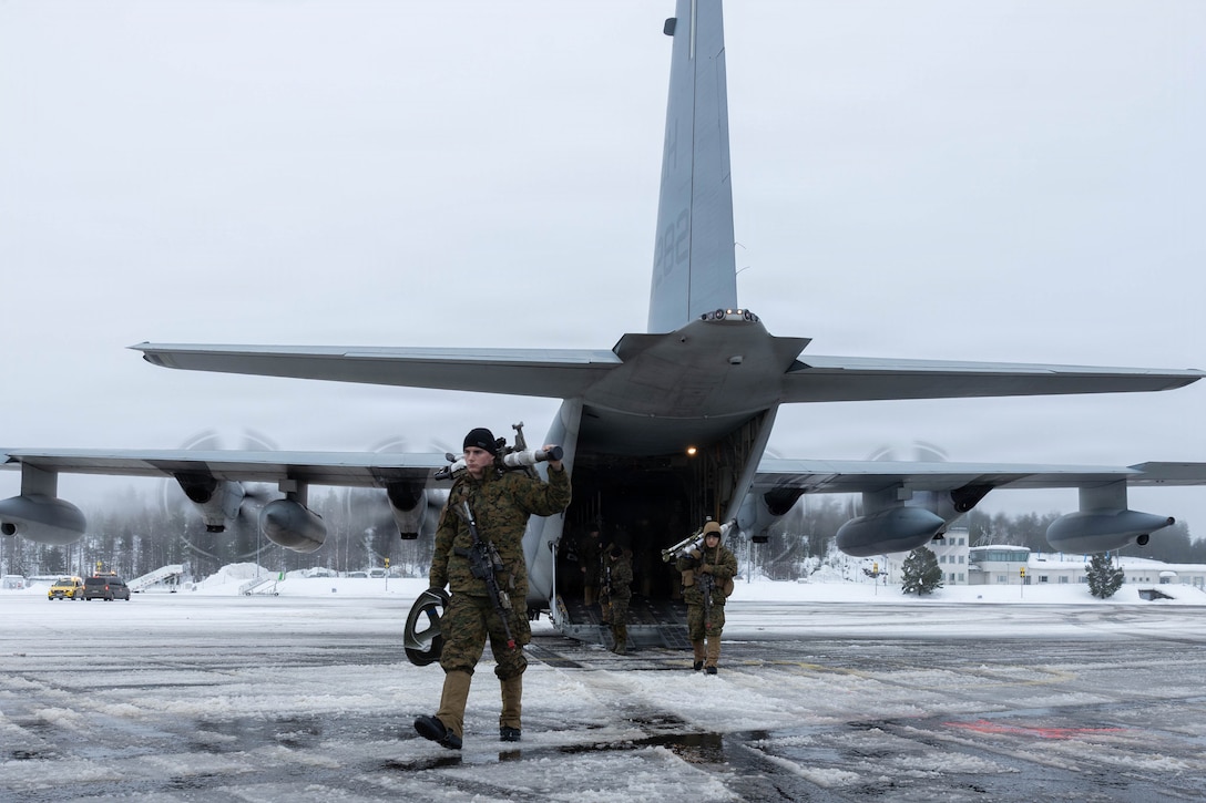 U.S. Marines with 2nd Battalion, 6th Marine Regiment, 2nd Marine Division, depart a KC-130J Super Hercules aircraft with Marine Aerial Refueler Transport Squadron (VMGR) 252, Marine Aircraft Group 14, 2nd Marine Aircraft Wing, at Rovaniemi Air Base, Finland, March 11, 2026. VMGR-252 transported Marines with 2nd Battalion to exercise their deployment capabilities during exercise Cold Response 26. A key component of NATO's enhanced vigilance activity Arctic Sentry, exercise Cold Response 26 is a Norwegian-led winter military exercise designed to enhance collective defense capabilities and ensure U.S. readiness to rapidly deploy and seamlessly operate alongside NATO Allies in challenging arctic conditions. (U.S. Marine Corps photo by Cpl. Mya Seymour)