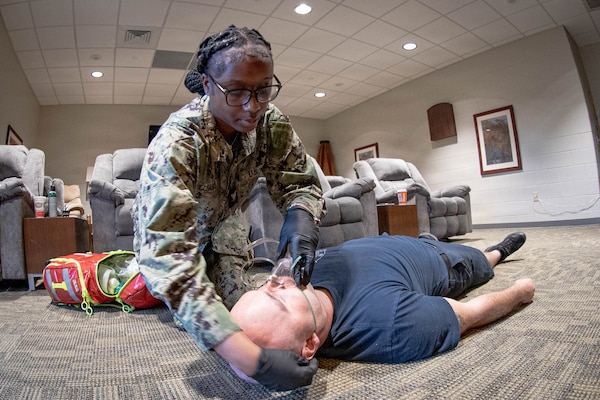 *Training* Hospital Corpsman Third Class Tamiyah Williams places a mask upon a simulated patient to assist their breathing while conducting a testing portion of the Emergency Medical Technician-Basic training hosted by the MCAS Cherry Point Fire and Emergency Services Department on March 11, 2026.  Williams and other Sailors assigned to Navy Medicine Readiness and Training Command Cherry Point participated in the training to enhance their skills and knowledge in providing emergency medical care in various scenarios.