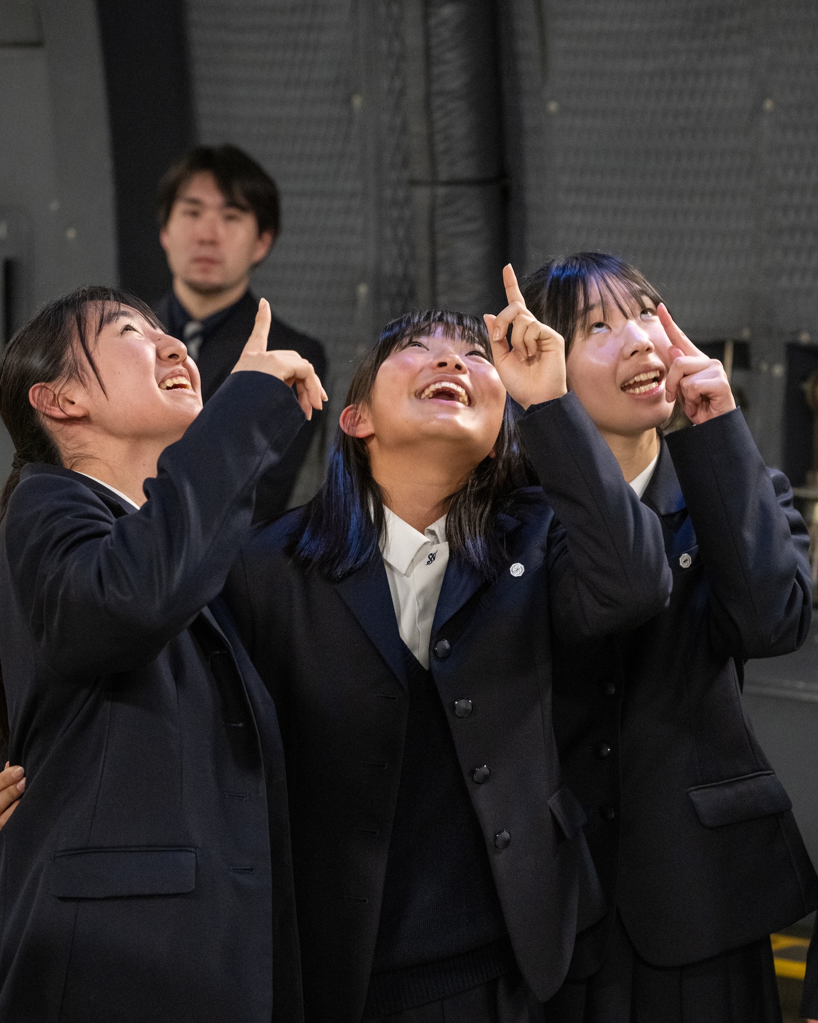 Students and teachers from Miyagi, Japan tour the inside of a C-5M Super Galaxy at Dover Air Force Base, Delaware, March 10, 2026. The visitors from the sister state of Miyagi also visited the base dining facility and participated in a traditional gift exchange with the base commander. (U.S. Air Force photo by Mauricio Campino)