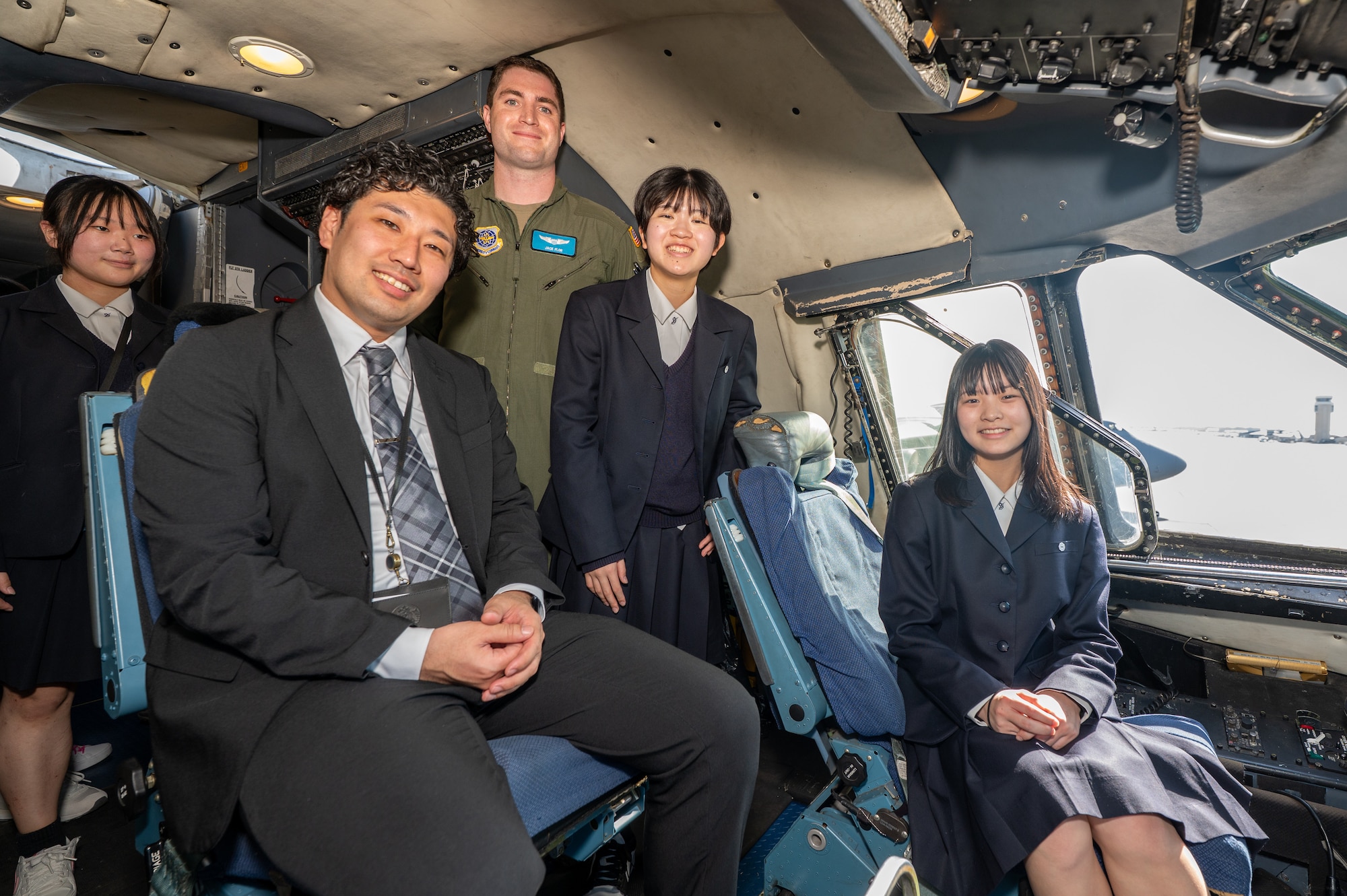 Students and teachers from Miyagi, Japan pose for a photo inside of a C-5M Super Galaxy, with U.S. Air Force Capt. Jack Flor, 9th Airlift Squadron pilot, at Dover Air Force Base, Delaware, March 10, 2026. Dover, Delaware, and its sister city Iwanuma, Japan, have an established partnership through the Delaware-Miyagi Prefecture exchange program. This relationship focuses on cultural, educational, sports and tourism exchanges, including annual visits to the Dover Air Force Base. (U.S. Air Force photo by Mauricio Campino)