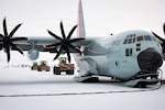 A LC-130 Hercules from the 109th Airlift Wing is loaded with cargo at Williams Field, Antarctica, Dec. 22, 2025. The ski-equipped cargo aircraft supports Operation Deep Freeze, the Department of War's annual mission to provide logistical support to the National Science Foundation in Antarctica. Photo by Tech. Sgt. Gabriel Enders.