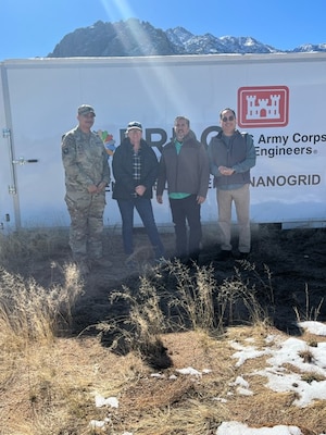 The team that ensured proper delivery, placement, and installation of the nanogrid at Fort Bliss, Texas. From left: SFC Aileen Keemer, 1st Armored Division at Fort Bliss; Patricia Cutler, wildlife biologist at U.S. Army Garrison White Sands; Carlos Molina, energy manager at Fort Bliss Directorate of Public Works; Benito Perez, research engineer at the Engineer Research Development Center’s Construction Engineering Research Laboratory