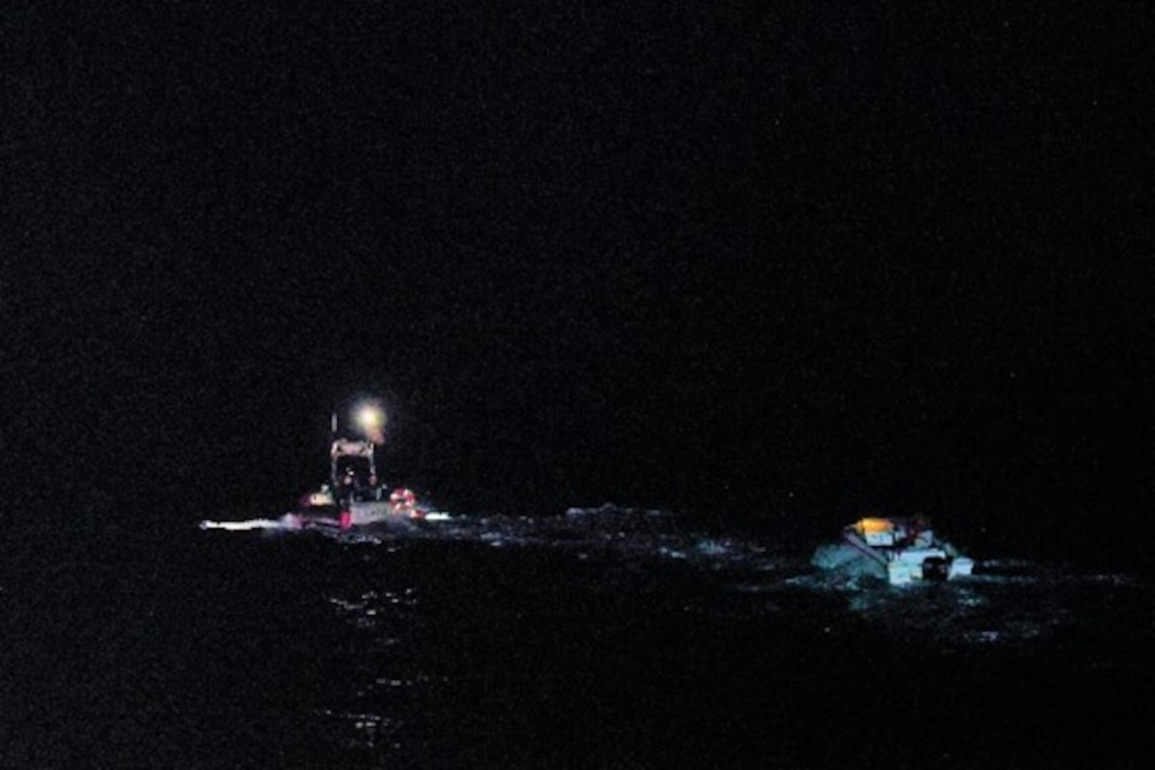 Coast Guard air and surface assets rescued two fishermen aboard a disabled overdue vessel in Mona Passage waters off Desecheo, Puerto Rico, March 15, 2026.  The Coast Guard Cutter Joseph Napier towed the vessel to safe harbor in Mayaguez, Puerto Rico.  No medical concerns reported in this case (U.S. Coast Guard photo)