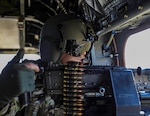 101st Combat Aviation Brigade Soldiers conduct aerial gunnery tables from the new rear cabin windows in the Block II CH-47F at Fort Knox, Ky.