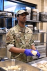 Senior Airman Jared Mack, 5th Force Support Squadron food services team member, prepares ingredients during an internal cooking competition at the dining facility at Minot Air Force Base, North Dakota, Feb. 12, 2026. A cook-off at the dining facility gave Airmen the opportunity to develop new menu ideas, sharpen their cooking techniques and work together in a competitive setting. (U.S. Air Force photo by Airman Joseline Chacon Monterroso)