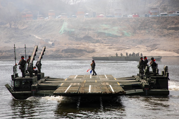 Republic of Korea Army soldiers of the 7th Engineer Brigade, operate a KM3 ROK amphibious rig to transfer vehicles across the river during wet gap crossing exercise as part of Freedom Shield near Yeoncheon, South Korea, Mar. 14, 2026.