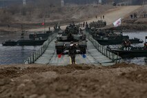 ROK Army soldiers assigned to the 16th Mechanized Infantry Brigade, drive the K2 Black Panther across the fully constructed Improved Ribbon Bridge during wet gap crossing exercise as part of Freedom Shield near Yeoncheon, South Korea, Mar. 14, 2026