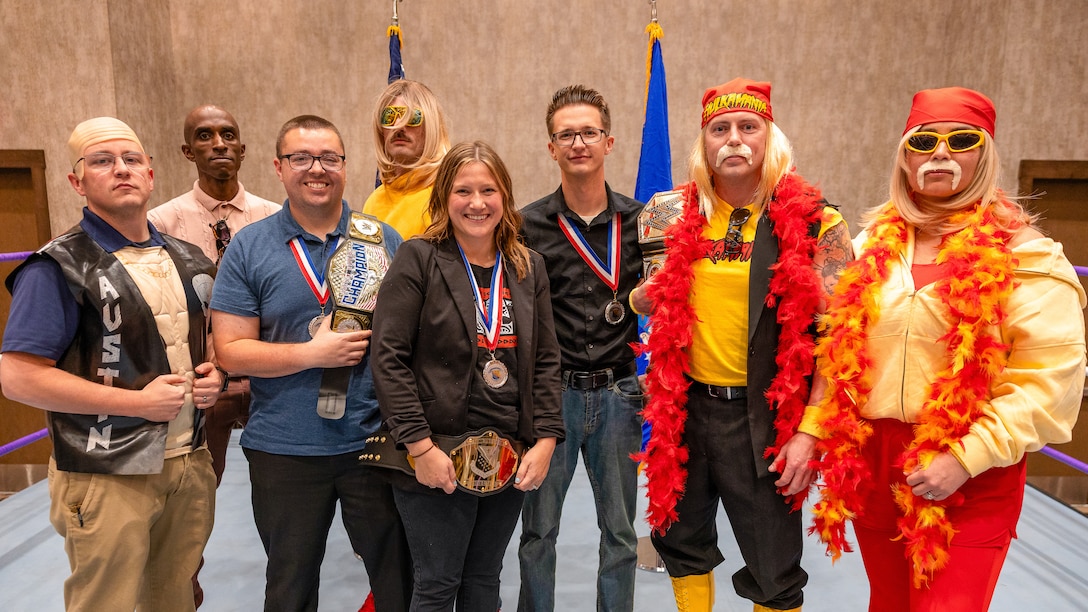 Award winners, nominees, and attendees pose in the ring for a group photo after the ceremony during the 2025 Annual Awards Banquet in Wichita Falls, Texas, Feb. 27, 2026.