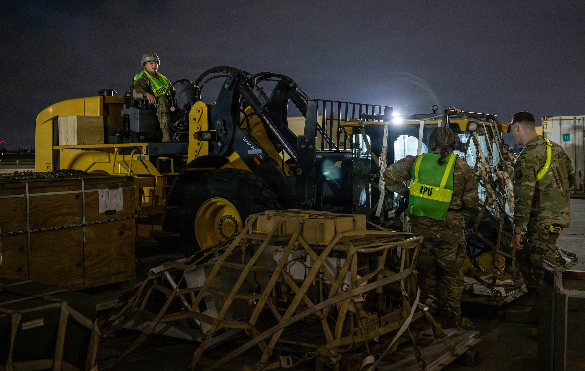 Airmen perform joint inspections on cargo.