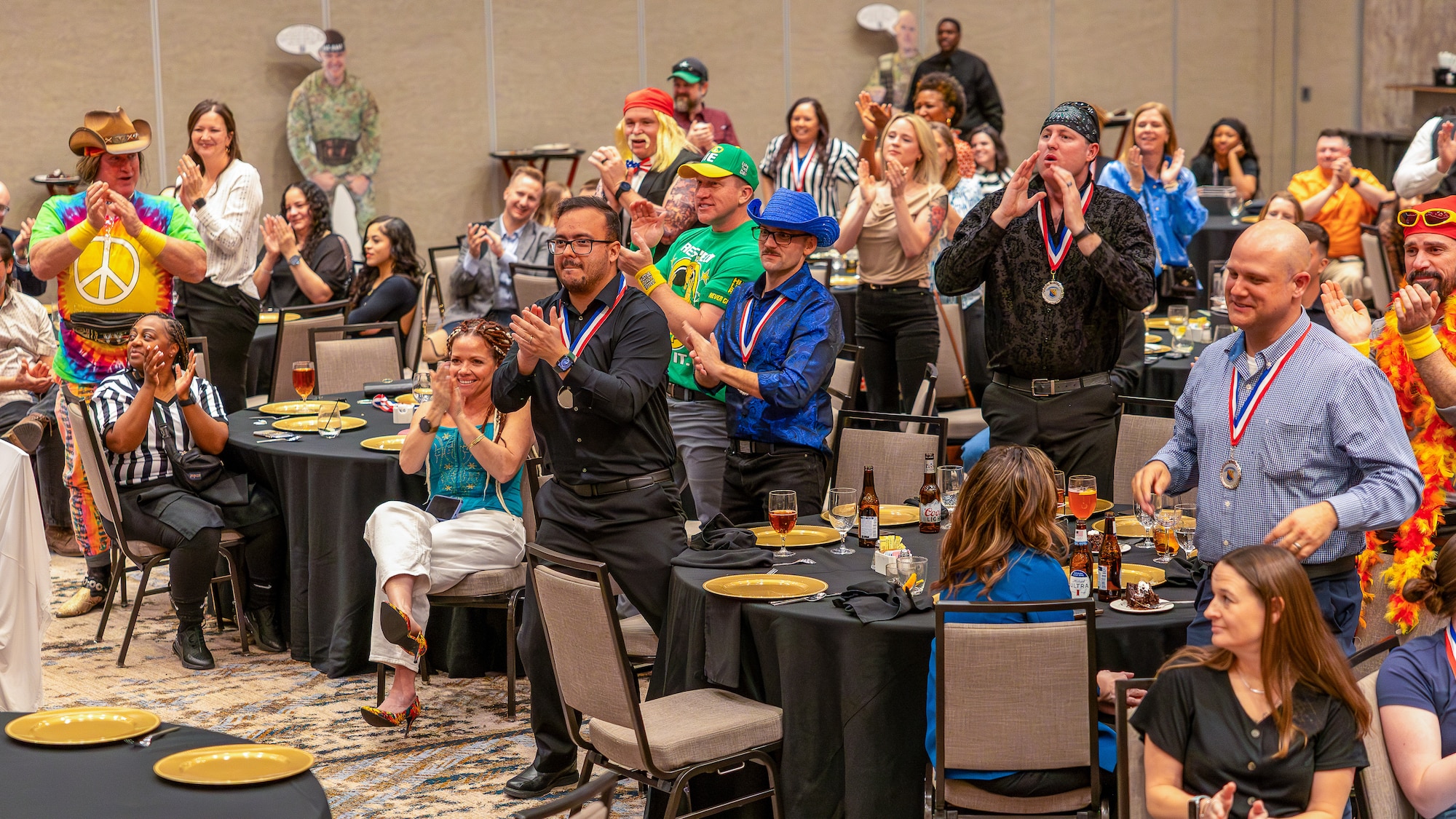 Attendees cheer as award recipients are recognized during the 2025 Annual Awards Banquet in Wichita Falls, Texas, Feb. 27, 2026.