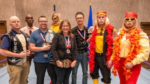 Award winners, nominees, and attendees pose in the ring for a group photo after the ceremony during the 2025 Annual Awards Banquet in Wichita Falls, Texas, Feb. 27, 2026.