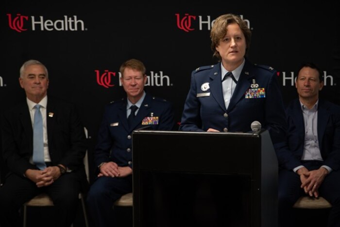 Col. Valerie Sams, director of C-STARS Cincinnati, U.S. Air Force, and trauma surgeon at University of Cincinnati (UC) Medical Center, speaks during the ribbon-cutting ceremony for the expanded Center for Sustainment of Trauma and Readiness Skills (C-STARS) Cincinnati DARRIO Simulation Center at UC Medical Center in Cincinnati, Ohio, March 11, 2026. C-STARS Cincinnati is a joint program between UC Health and the U.S. Air Force that provides advanced trauma and critical care training for military medical personnel. The $10-million facility expansion, funded initially by Congress, prepares U.S. Air Force medical teams to deliver lifesaving care in combat zones, humanitarian missions and complex civilian emergencies. (U.S. Air Force photo / Richard Eldridge)