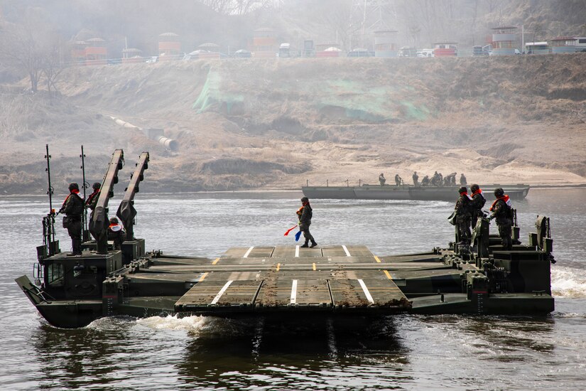 Republic of Korea Army soldiers of the 7th Engineer Brigade, operate a KM3 ROK amphibious rig to transfer vehicles across the river during wet gap crossing exercise as part of Freedom Shield near Yeoncheon, South Korea, Mar. 14, 2026.