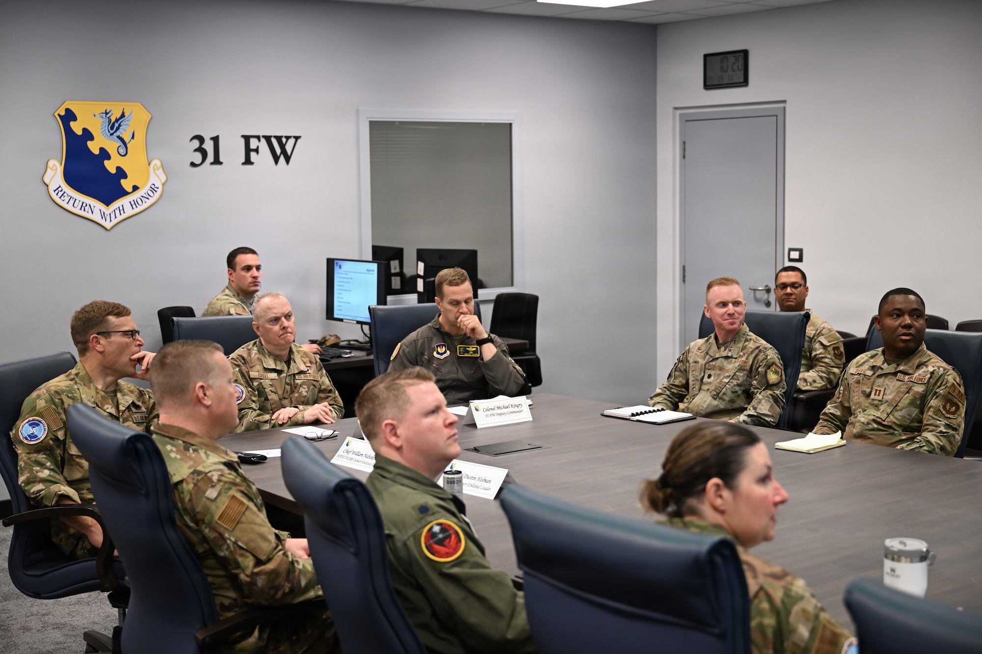 Leadership are in a meeting.
