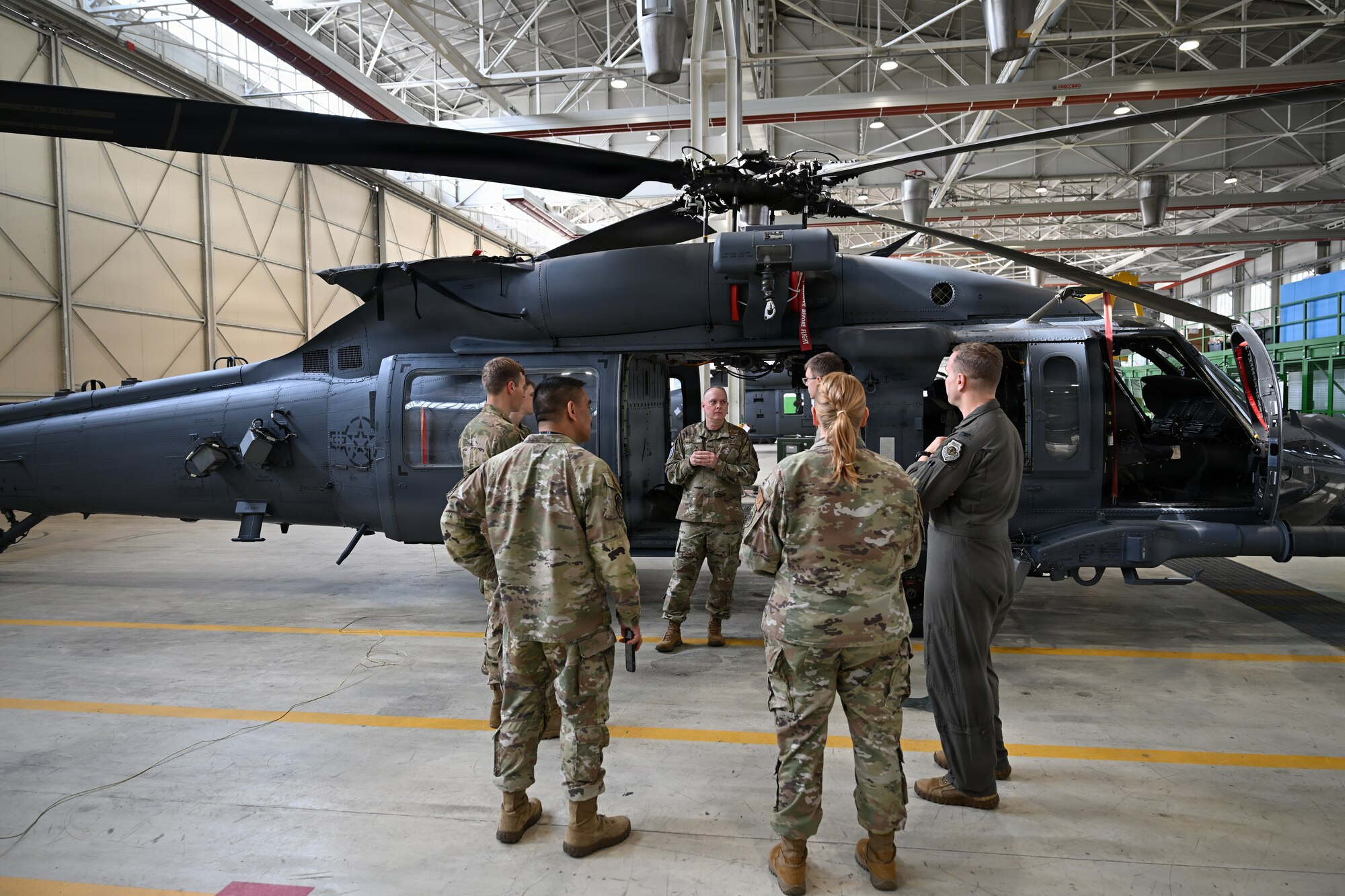 NIRSF leadership gets tour of a helicopter.