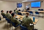 Dr. Geoffrey S. Jacoby, an occupational medicine physician from Branch Health Clinic Port Hueneme, instructs Sailors during a National Institute for Occupational Safety and Health (NIOSH)-certified spirometry training course at Robert E. Bush Naval Hospital, Feb. 25, 2026. The three-day course trains medical personnel to perform pulmonary function testing used to detect occupational lung disease early and support the long-term health and readiness of service members and civilian personnel. (Courtesy Photo).
