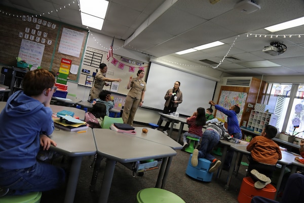 Dentists and hygienists from Naval Health Clinic Lemoore visited two elementary schools on Naval Air Station Lemoore to teach children the importance of dental hygiene. Lt. Hannah Mills, Lt. Tri Nguyen, Lt. Dikran Diarian and dental hygienist Brenda Guerzon presented oral health education to students from preschool through third grade at Neutra Elementary School on Feb. 25 and Akers School on Feb. 27.