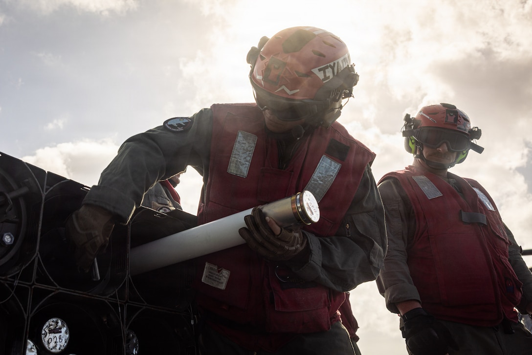 U.S. Marines with Marine Medium Tiltrotor Squadron (VMM) 263 (Reinforced), prepare to load ordnance on an AH-1Z Viper helicopter aboard San Antonio-class amphibious transport dock USS Fort Lauderdale (LPD 28) while underway in the Caribbean Sea, Feb. 27, 2026. U.S. military forces are deployed to the Caribbean in support of the U.S. Southern Command mission, Department of War-directed operations, and the president's priorities to disrupt illicit drug trafficking and protect the homeland. (U.S. Marine Corps photo)