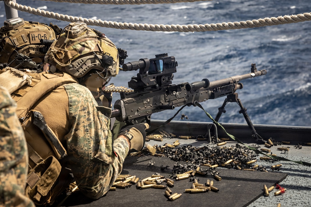 U.S. Marines with Maritime Special Purpose Force, 22nd Marine Expeditionary Unit (Special Operations Capable) engage a target during a crew served weapons shoot aboard San Antonio-class amphibious transport dock ship USS Fort Lauderdale (LPD 28) while underway in the Caribbean Sea, March 8, 2026. U.S. military forces are deployed to the Caribbean in support of the U.S. Southern Command mission, Department of War-directed operations, and the president's priorities to disrupt illicit drug trafficking and protect the homeland. (U.S. Marine Corps photo)