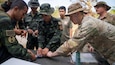 Soldiers from 1st Engineer Regiment, Royal Thai Army and Reserve Soldiers from the 444th Engineer Company, 412th Theater Engineer Command collaborate on the preparation of a practice rubber strip charge during demolition preparation training March 11, 2026, at the Royal Thai Army Artillery Center in Lop Buri, Thailand, part of Hanuman Guardian. 

 Hanuman Guardian 26 is a bilateral training exercise between the U.S. Army and the Royal Thai Army in the Kingdom of Thailand. Now in its 17th year, the exercise enhances readiness through realistic training while reinforcing the enduring U.S.–Thailand alliance, one of America’s oldest partnerships, dating back to 1833, and a shared commitment to a free and open Indo-Pacific. (U.S. Army Reserve photo by Maj. Darryl Beatty )